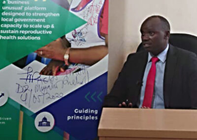 Le médecin de la division de Kawempe réfléchit aux changements positifs résultant de l'engagement de TCI .