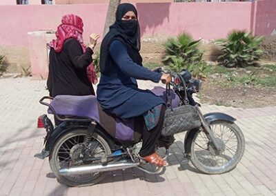 Motorbike-Riding Lady Health Worker Empowers Women in Karachi West with Door-to-Door Family Planning Counseling and Services
